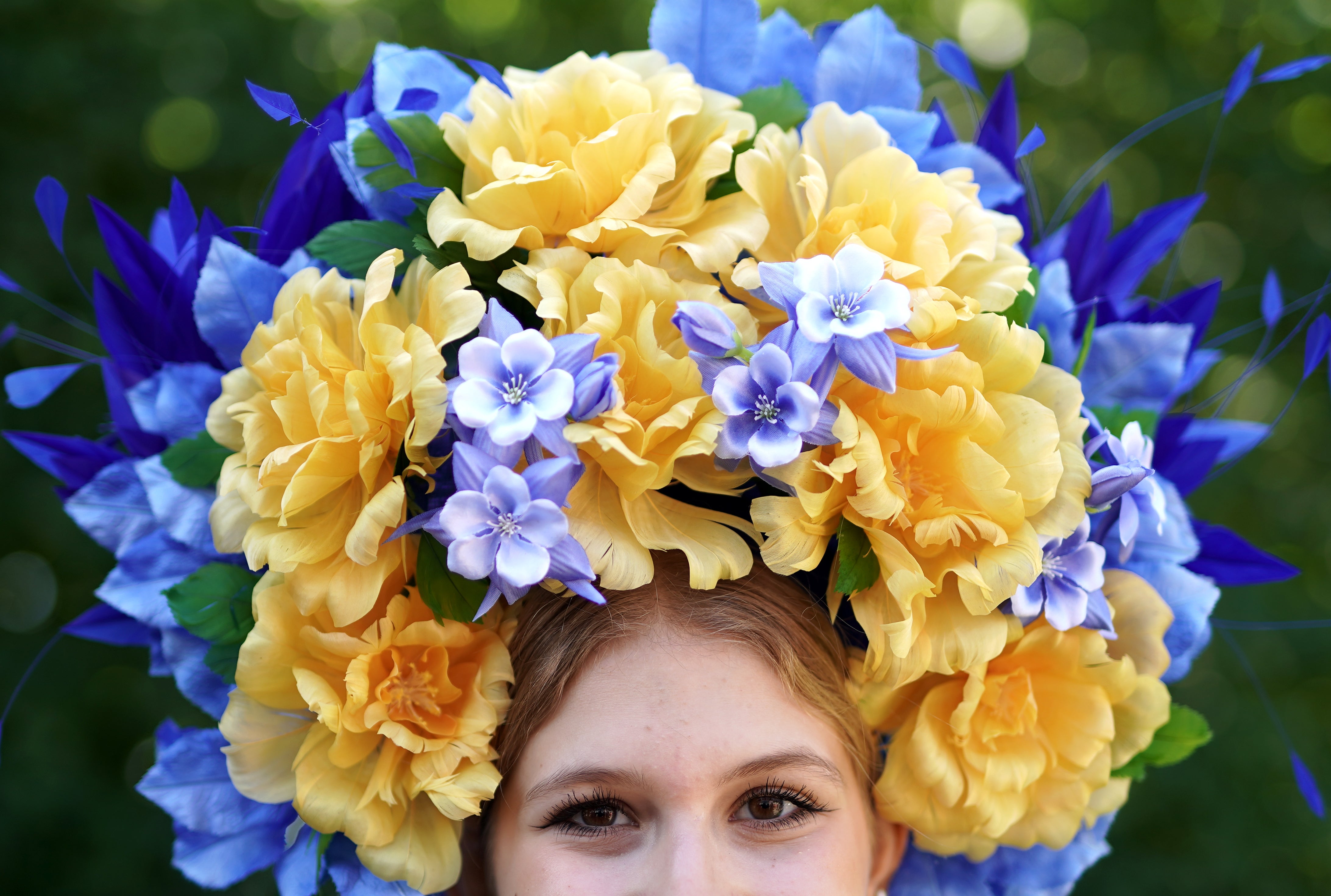 Racegoer Maria Turtus’s hat paid tribute to her mother’s Ukrainian homeland (Aaron Chown/PA)