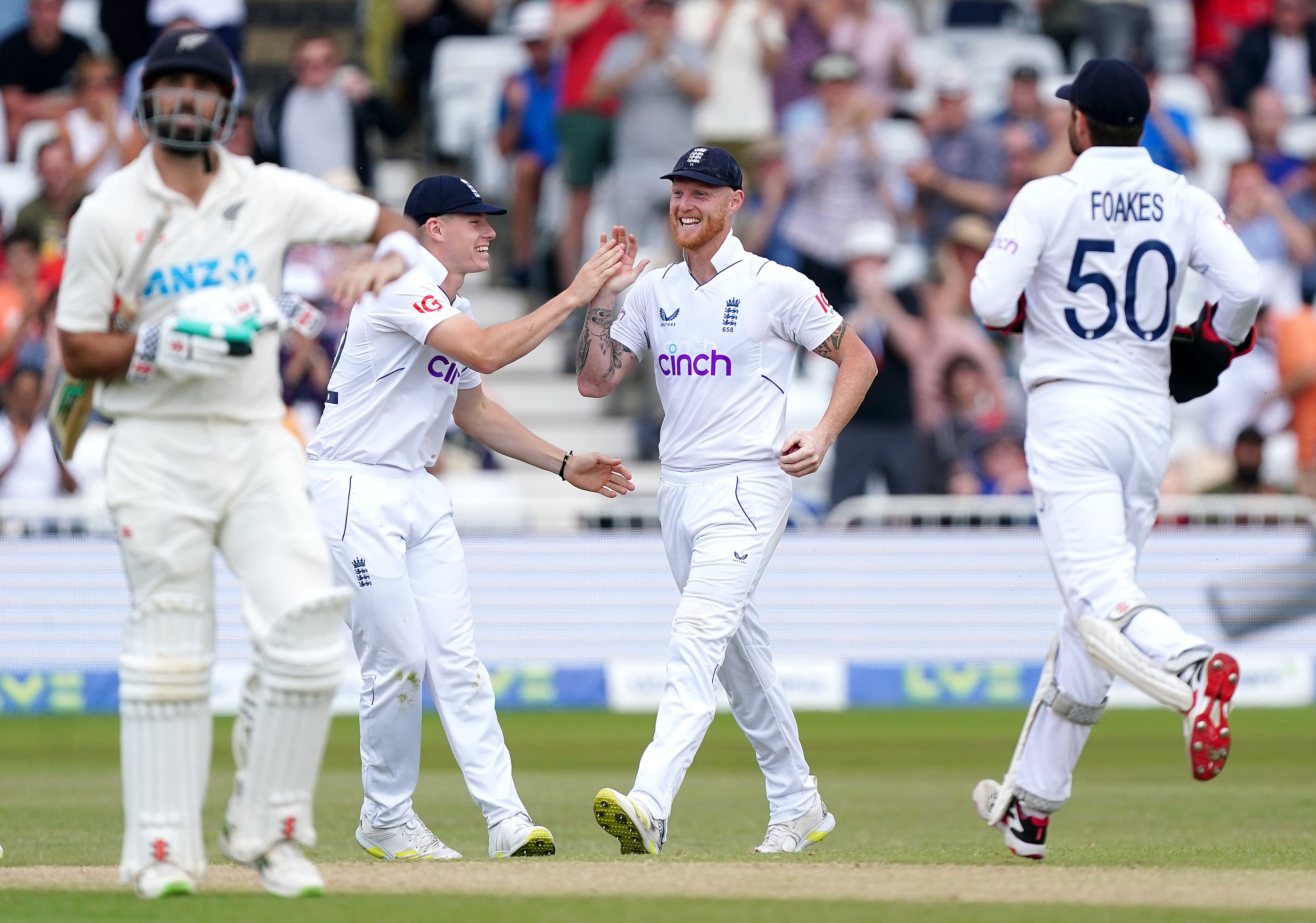 England captain Ben Stokes (centre) celebrates with team-mates after the dismissal of New Zealand’s last man Trent Boult (Mike Egerton/PA Images).
