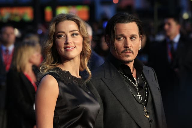 A jury in the US found a 2018 article Amber Heard wrote for the Washington Post about her experiences as a survivor of domestic abuse to be defamatory (Jonathan Brady/PA)