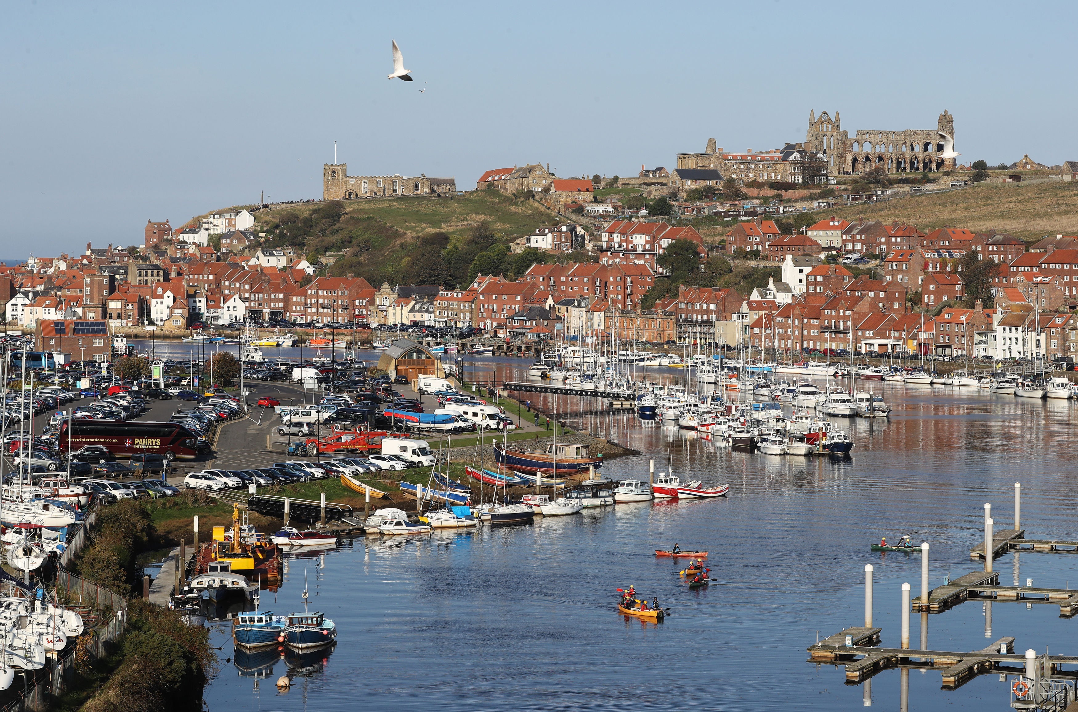Canoeists in Milton Harbour in the picturesque town of Whitby, North Yorkshire. (Owen Humphreys/PA)