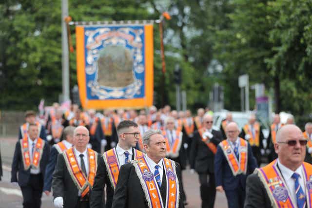 Orangemen march in Belfast (Niall Carson/PA)