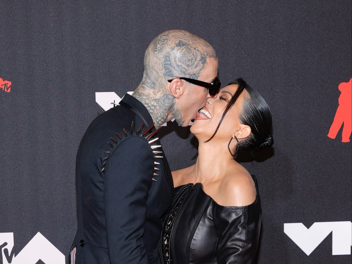 Kourtney Kardashian eats vegan chicken in lingerie with Travis Barker for seductive campaign 