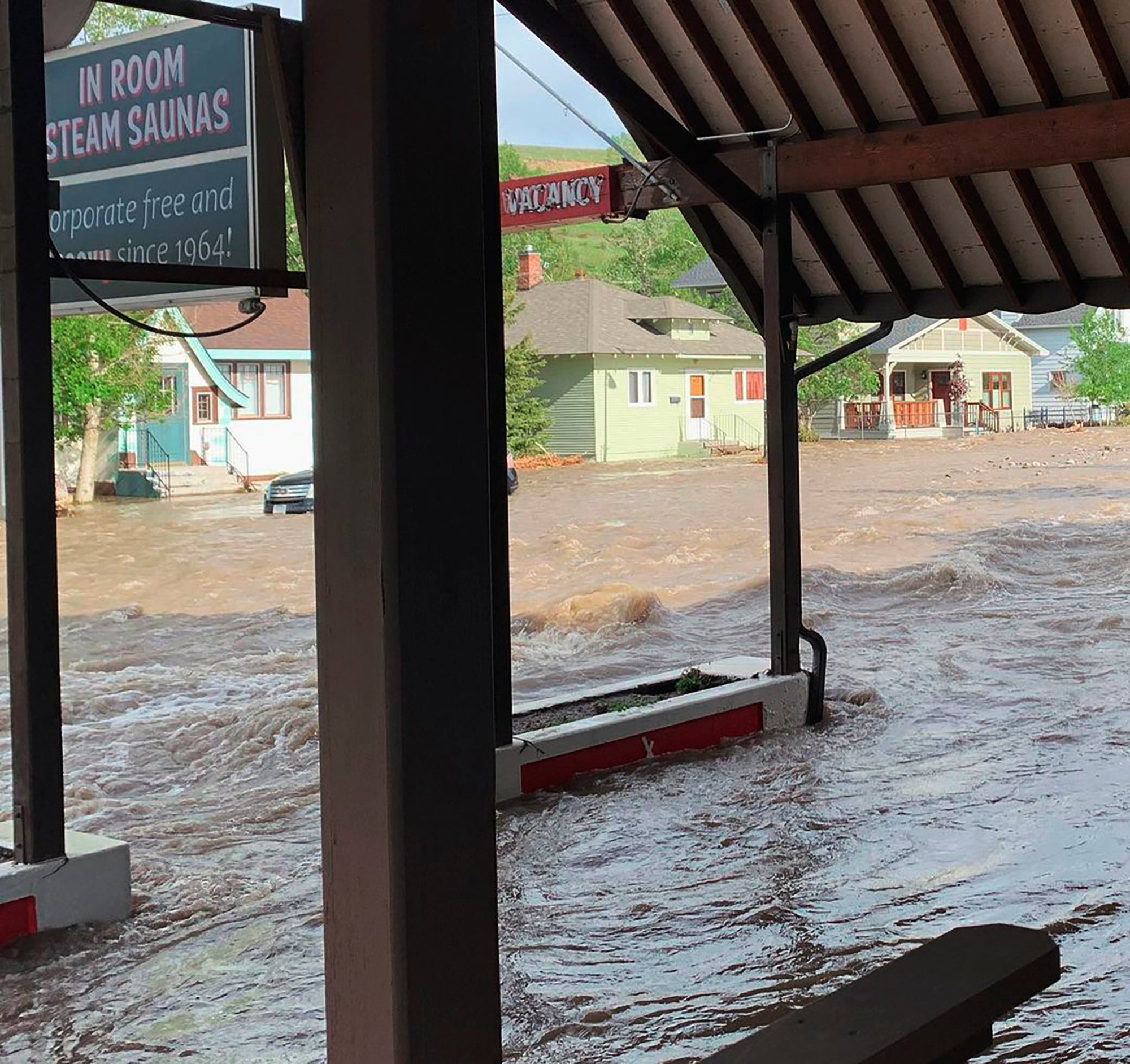 This photo provided to AP by Katherine Schoolitz shows flooding in Red Lodge, Mont., on Monday, June 13, 2022.