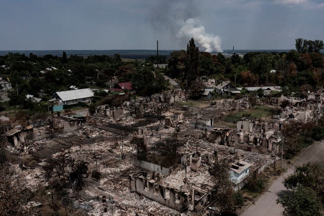 <p>Destroyed houses after an air strike in the town of Pryvillya in the eastern Ukrainian region of Donbas, in June  </p>