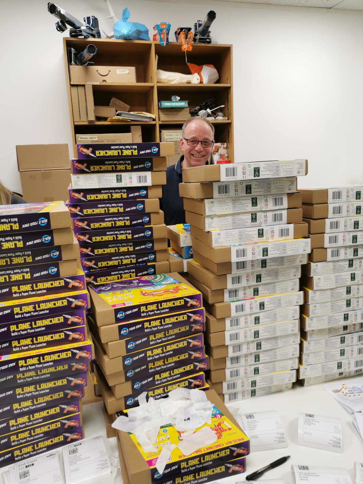 Keith Finch, 56, sorting Christmas orders of Build Your Own paper toy kits (Collect/PA Real Life)