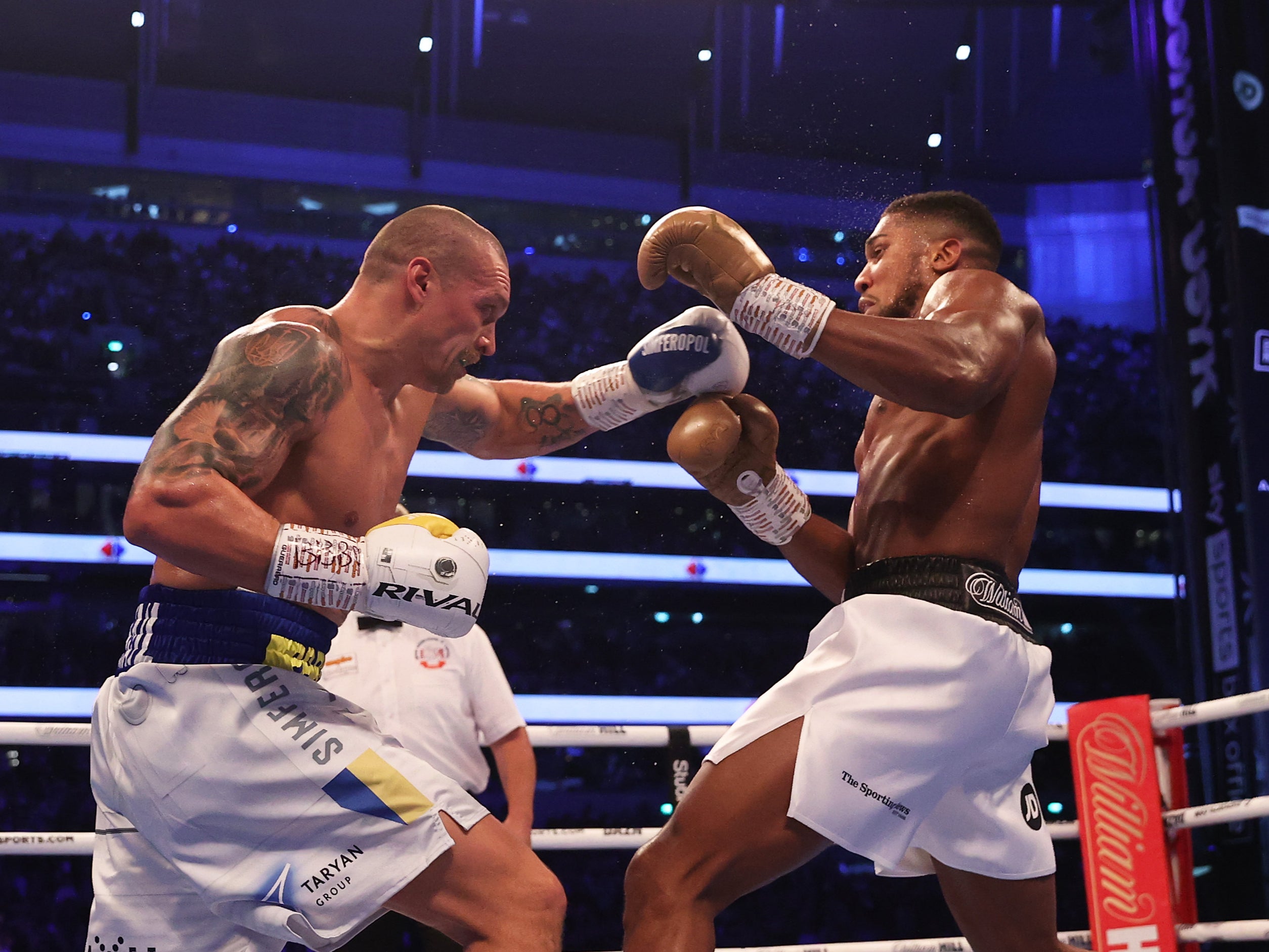 Joshua (right) was easily outpointed by Oleksandr Usyk in September