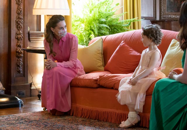 <p>Kate during her visit with Mila Sneddon in 2021</p>