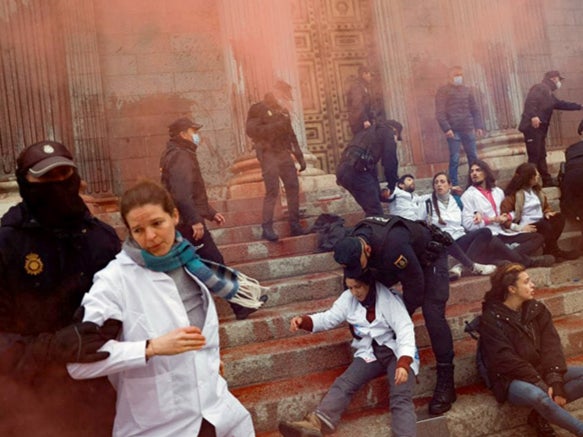 Scientists poured red dye over the front of the Congress building in Madrid in April to highlight global inaction on the climate crisis