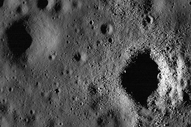<p>A crater in the “Sea of Storms” on the Moon</p>