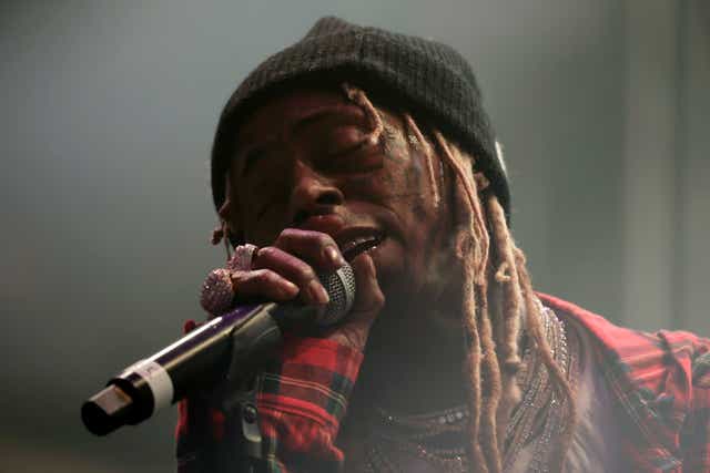 <p>Lil Wayne performs on 11 February in Los Angeles</p>