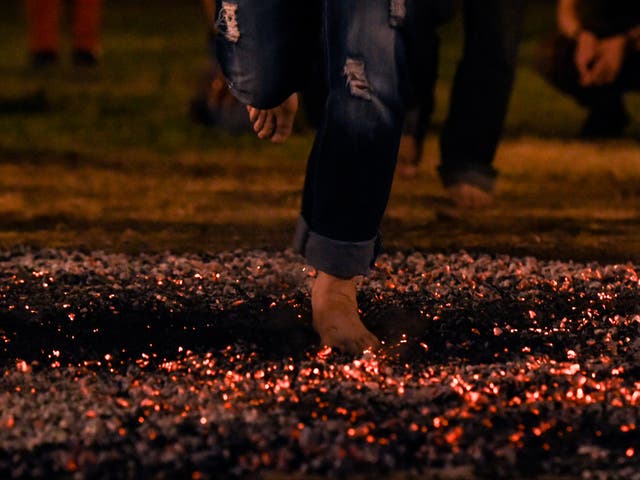 <p>File. Dozens of employees of a Swiss company, Goldbach were injured during a private team-building ‘fire-walking' exercise</p>