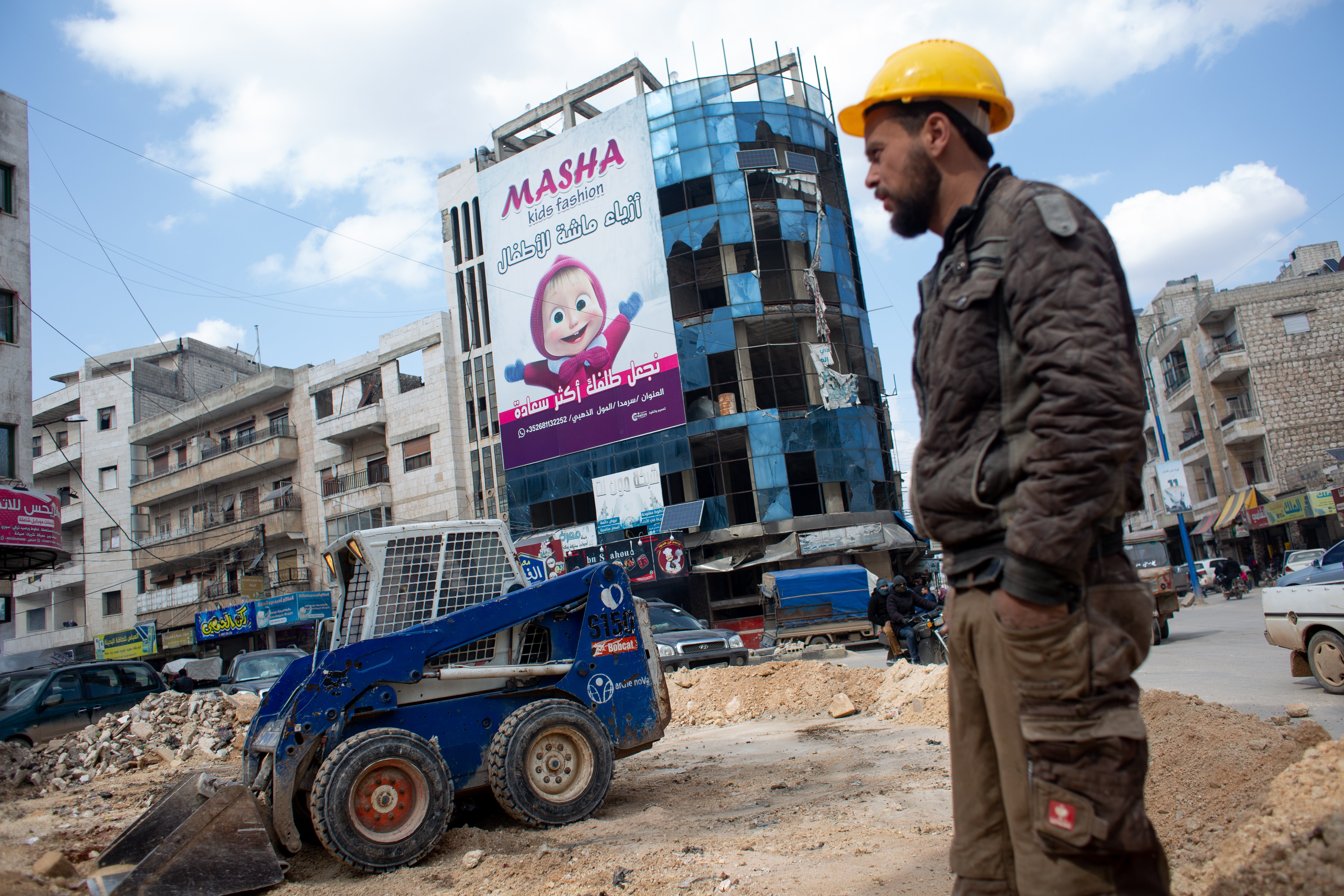 A road paving project near the market place in central Idlib city