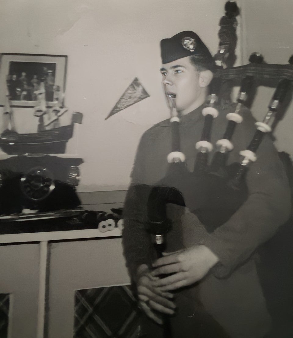 Pipe Major Riddell playing at home (PoppyScotland)