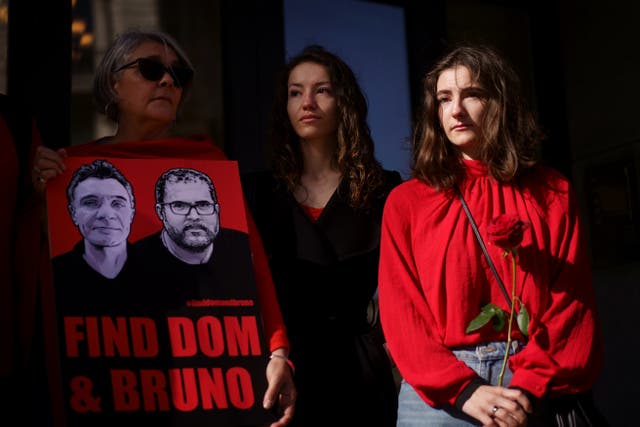 The family of Dom Phillips, from left: Helen Davies, Rhianna Davies and Domonique Davies at a vigil outside the Brazilian Embassy in London (PA)