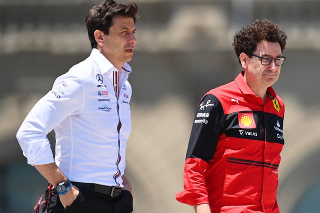 <p>Mercedes chief Toto Wolff (left) with Ferrari boss Mattia Binotto</p>