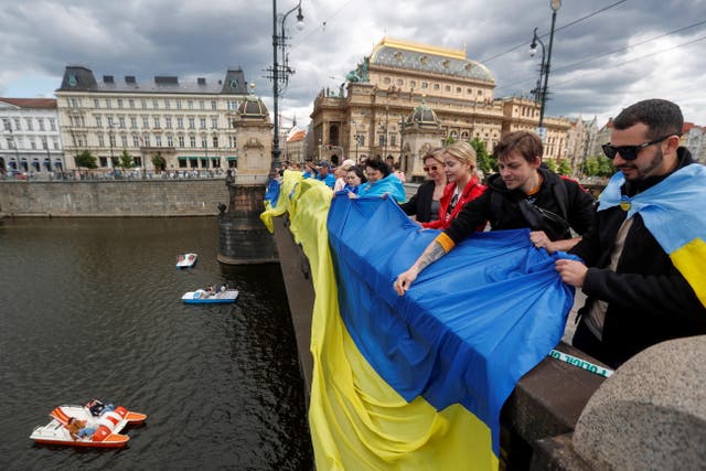 <p>Demonstrators participate in a Prague rally against Russia’s invasion of Ukraine last month</p>