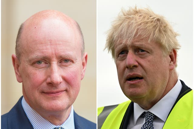 Lord Geidt, left, and Boris Johnson (Dominic Lipinski/Justin Tallis/PA)