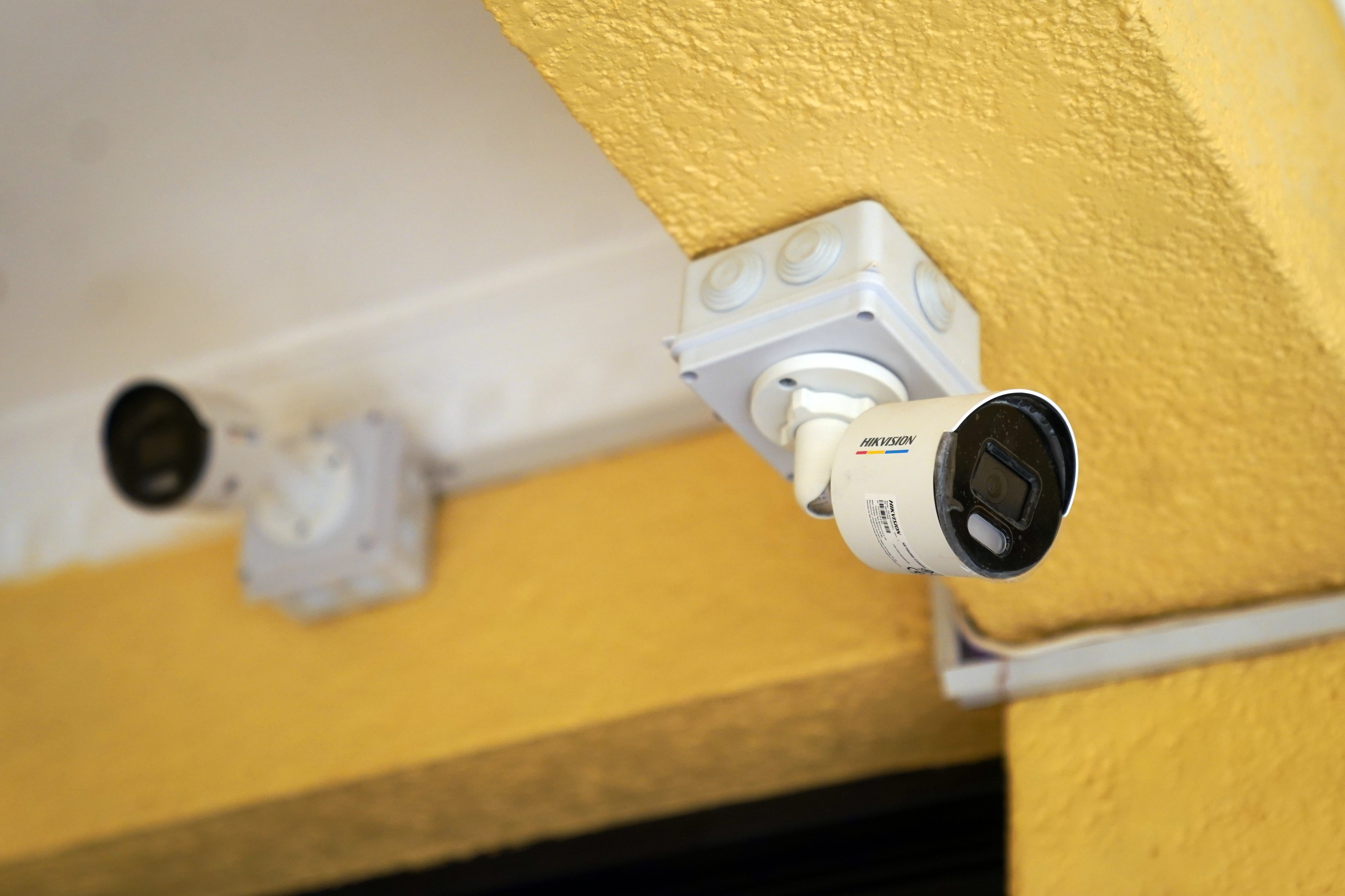 CCTV cameras in a corridor outside bedroom accommodation (Victoria Jones/PA)