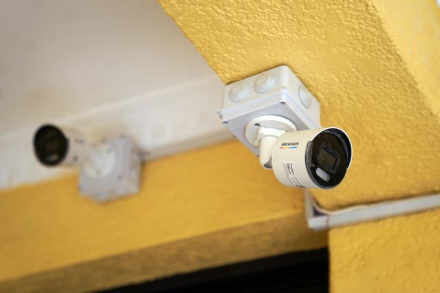 <p>CCTV cameras in a corridor outside bedroom accommodation</p>