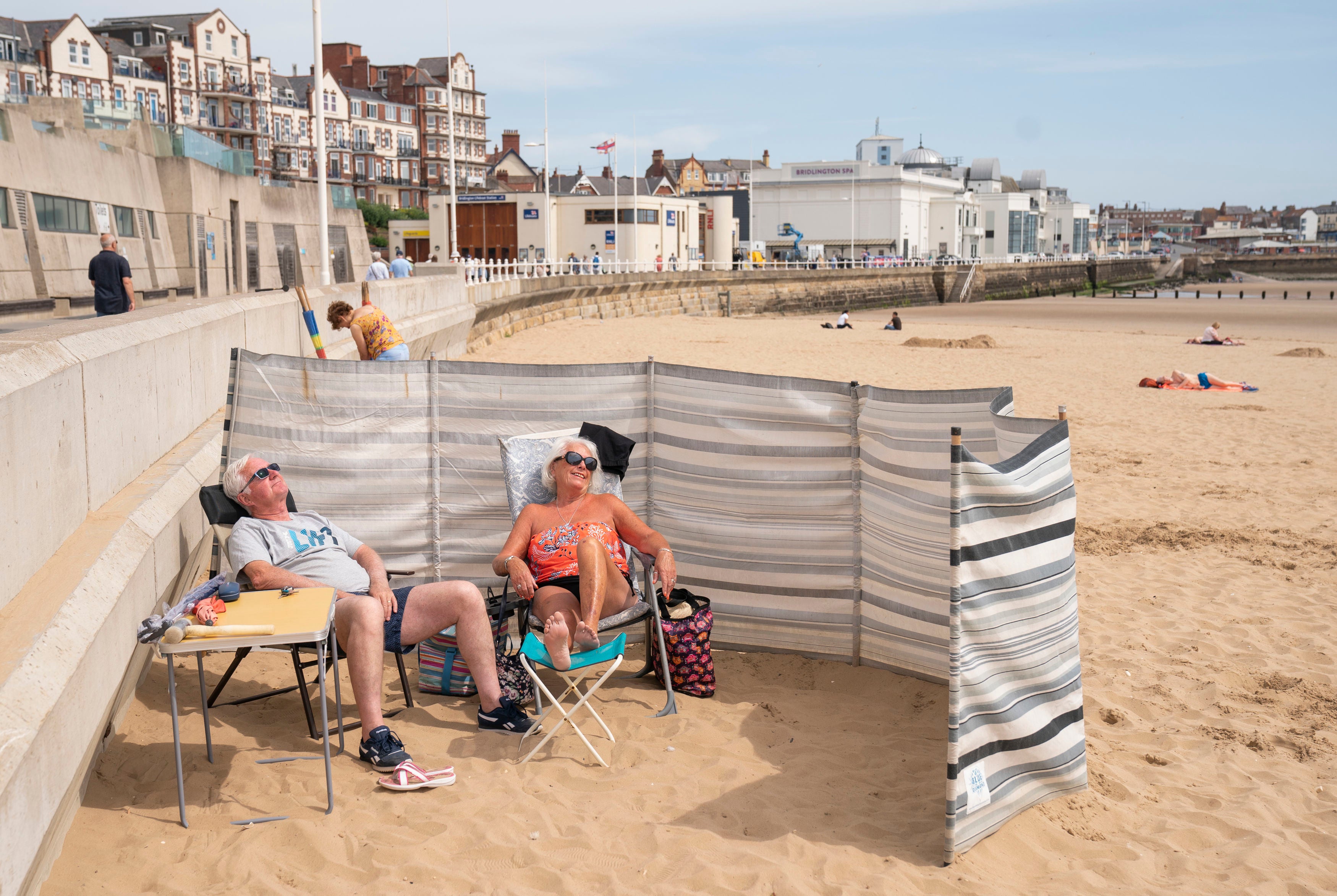 People sunbathe on Bridlington beach on the Yorkshire coast on Thursday