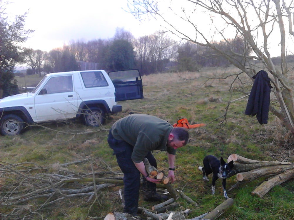 Ian collecting firewood with his dog Pepper (Collect/PA Real Life)