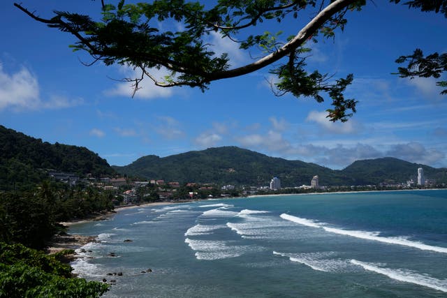 <p>Waves break on the empty tourist beach of Patong on Phuket, southern Thailand </p>