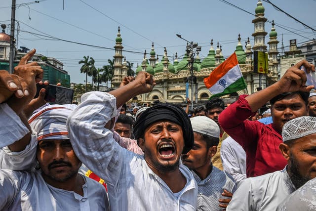 <p>Muslim activists take part in a unity rally to promote communal harmony in Kolkata on 14 June, following nationwide protests that erupted after remarks on Prophet by a former spokesperson from the ruling party</p>