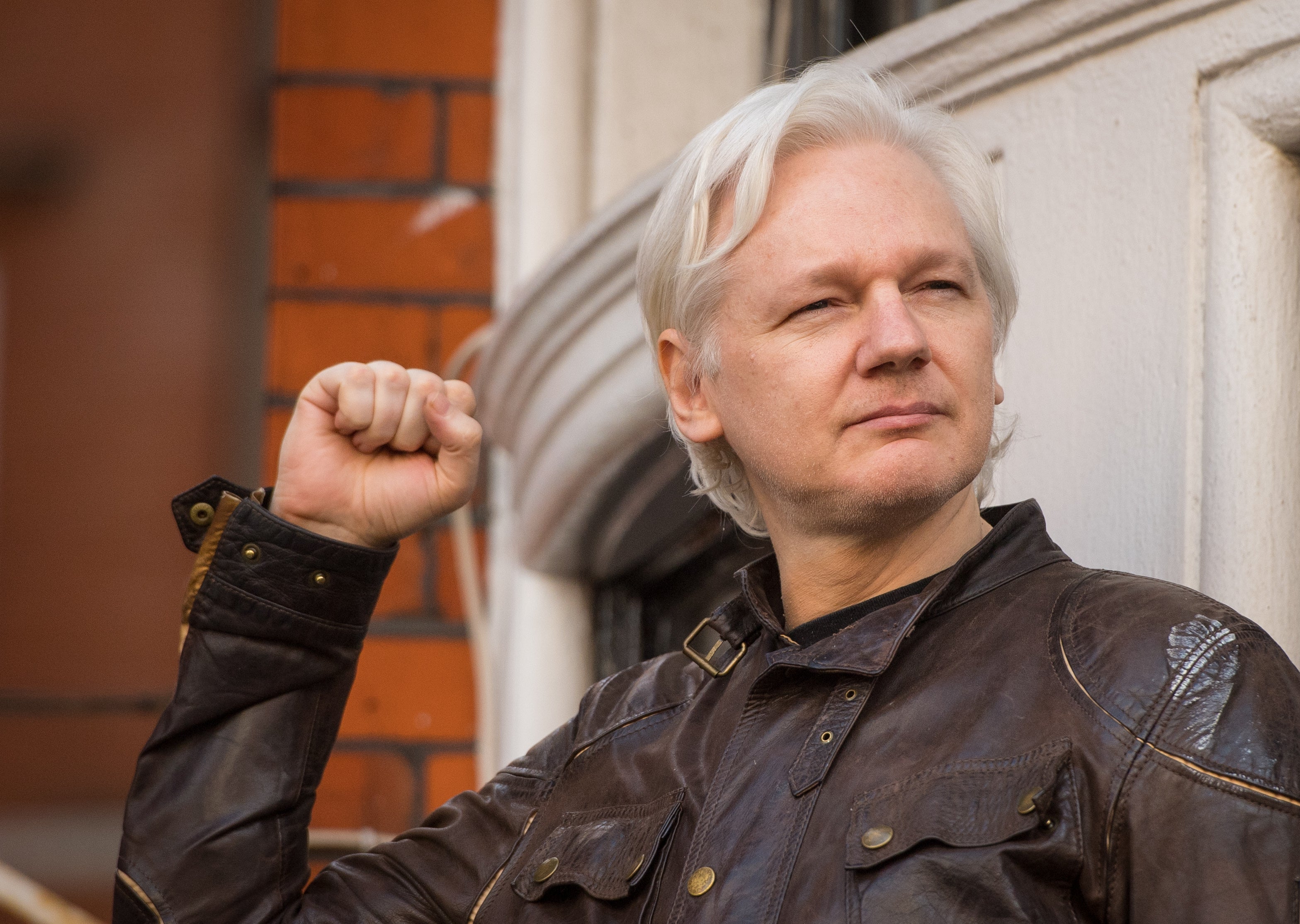 Julian Assange speaks from the balcony of the Ecuadorian embassy in London (Dominic Lipinski/PA)