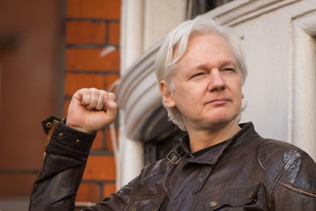 Julian Assange speaks from the balcony of the Ecuadorian embassy in London (Dominic Lipinski/PA)