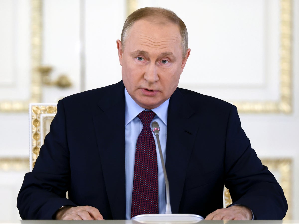 Vladimir Putin forced to delay keynote speech after cyberattack in Russia