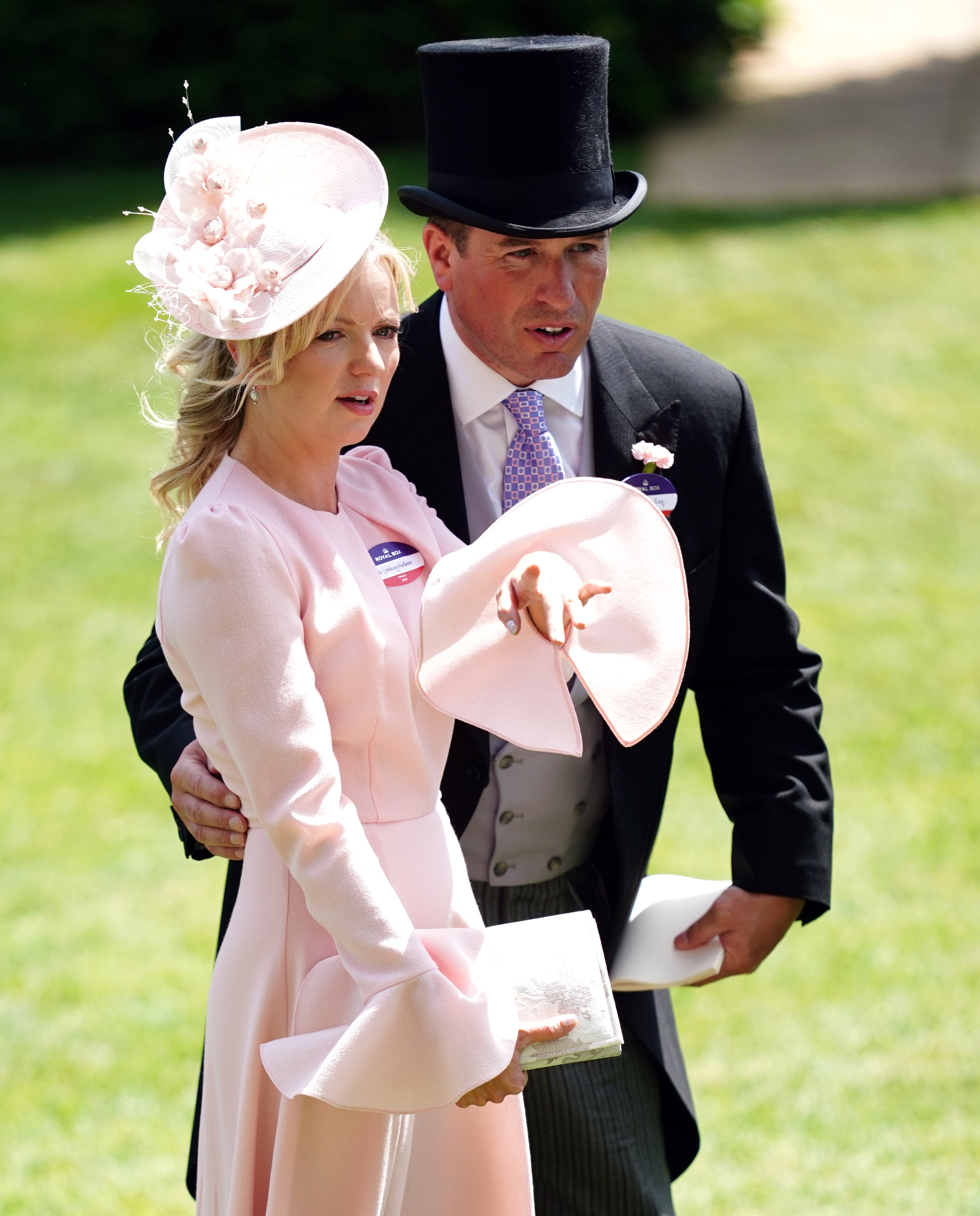 Lindsay Wallace and Peter Phillips (right) during day four of Royal Ascot (David Davies/PA)