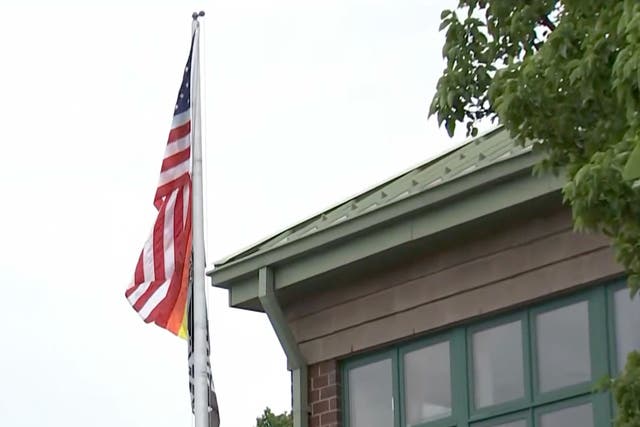 <p>The American, Pride, and Black Lives Matter flags outside the Nativity School of Worcester </p>