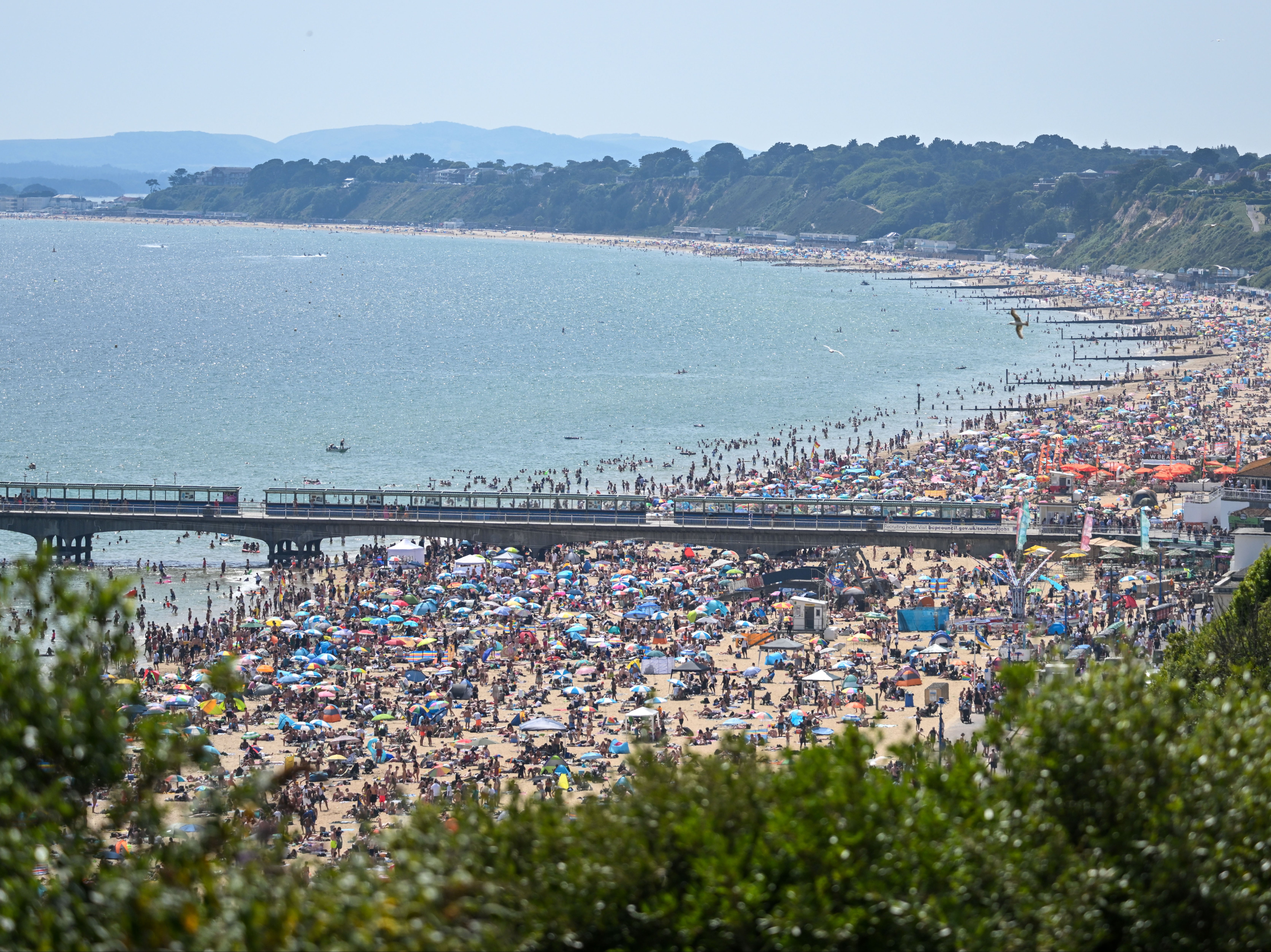 Crowds flocked to Bournemouth beach as UK saw hottest day of year so far