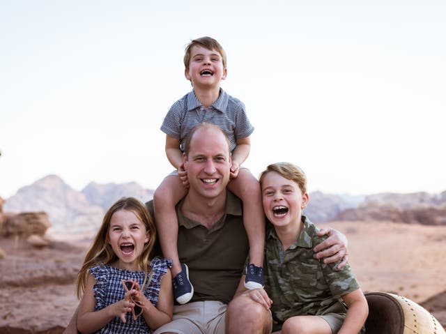 <p>Handout photo issued by Kensington Palace of the Duke of Cambridge with his children, Prince Louis, Prince George (right) and Princess Charlotte, to mark Father’s Day 2022</p>