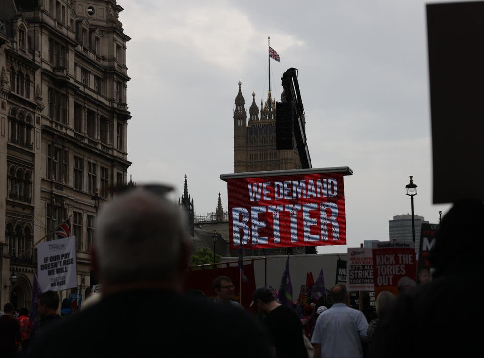 <p>Demonstrators took to Parliament Square as unions call for wage rises in cost-of-living crisis</p>