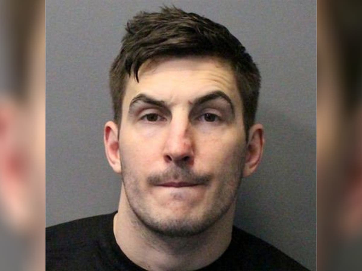 Fugitive jailed for threatening woman with axe before stealing &pound;25k Rolex