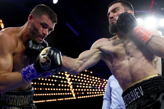 <p>Artur Beterbiev (right) added the WBO belt to his WBC and IBF light-heavyweight titles</p>