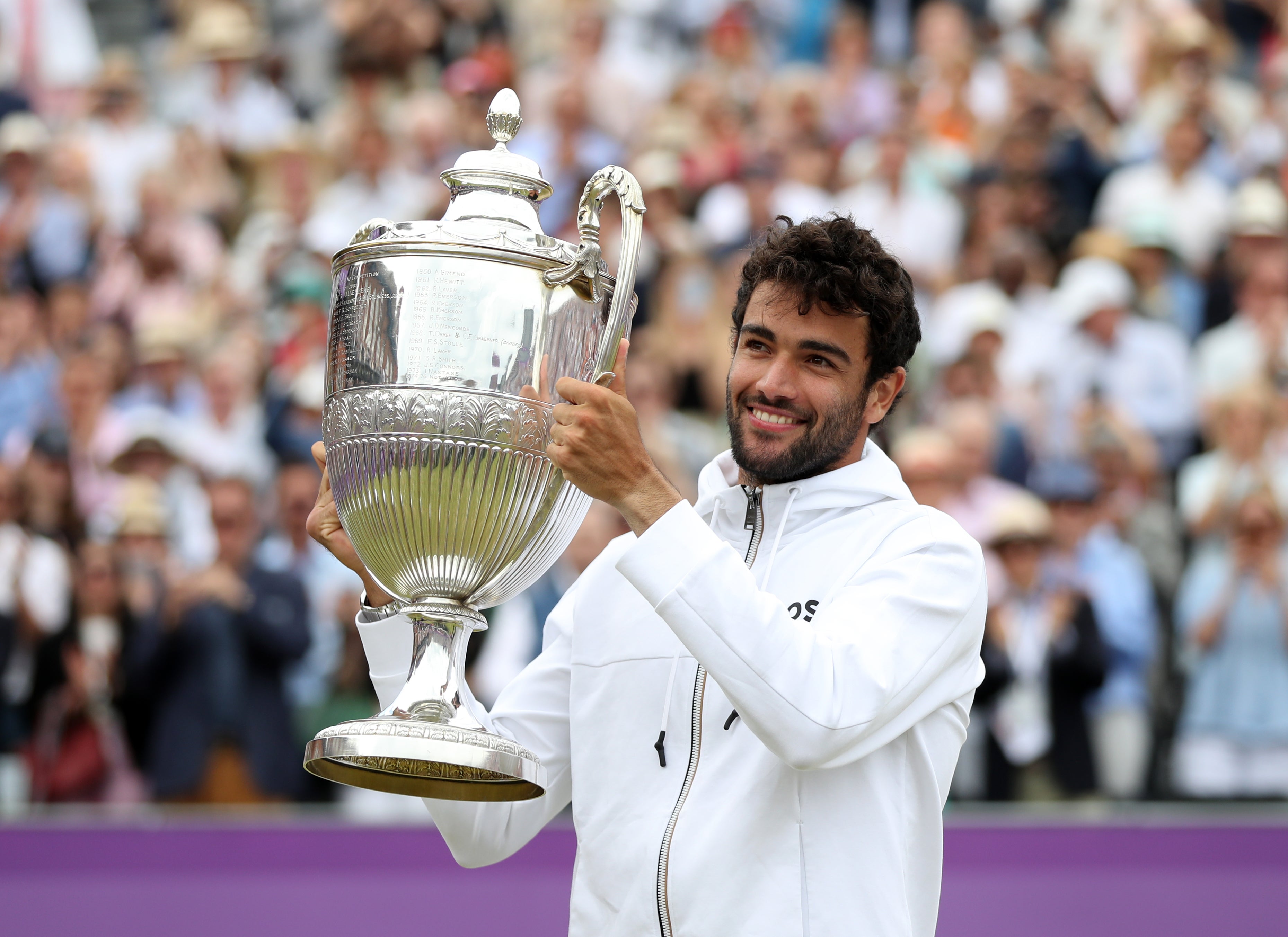 Matteo Berrettini lifts the trophy