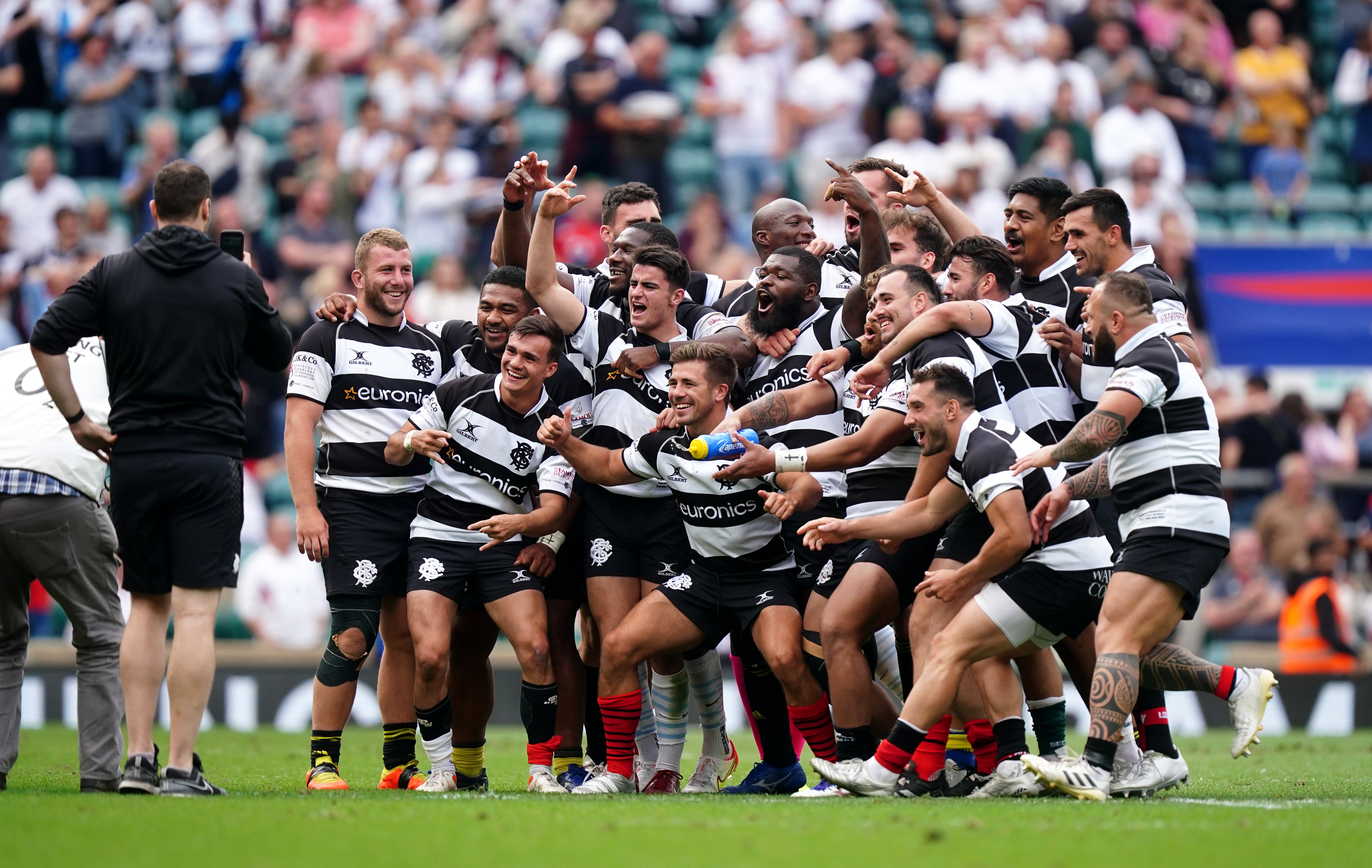 The Barbarians celebrate after their victory at Twickenham