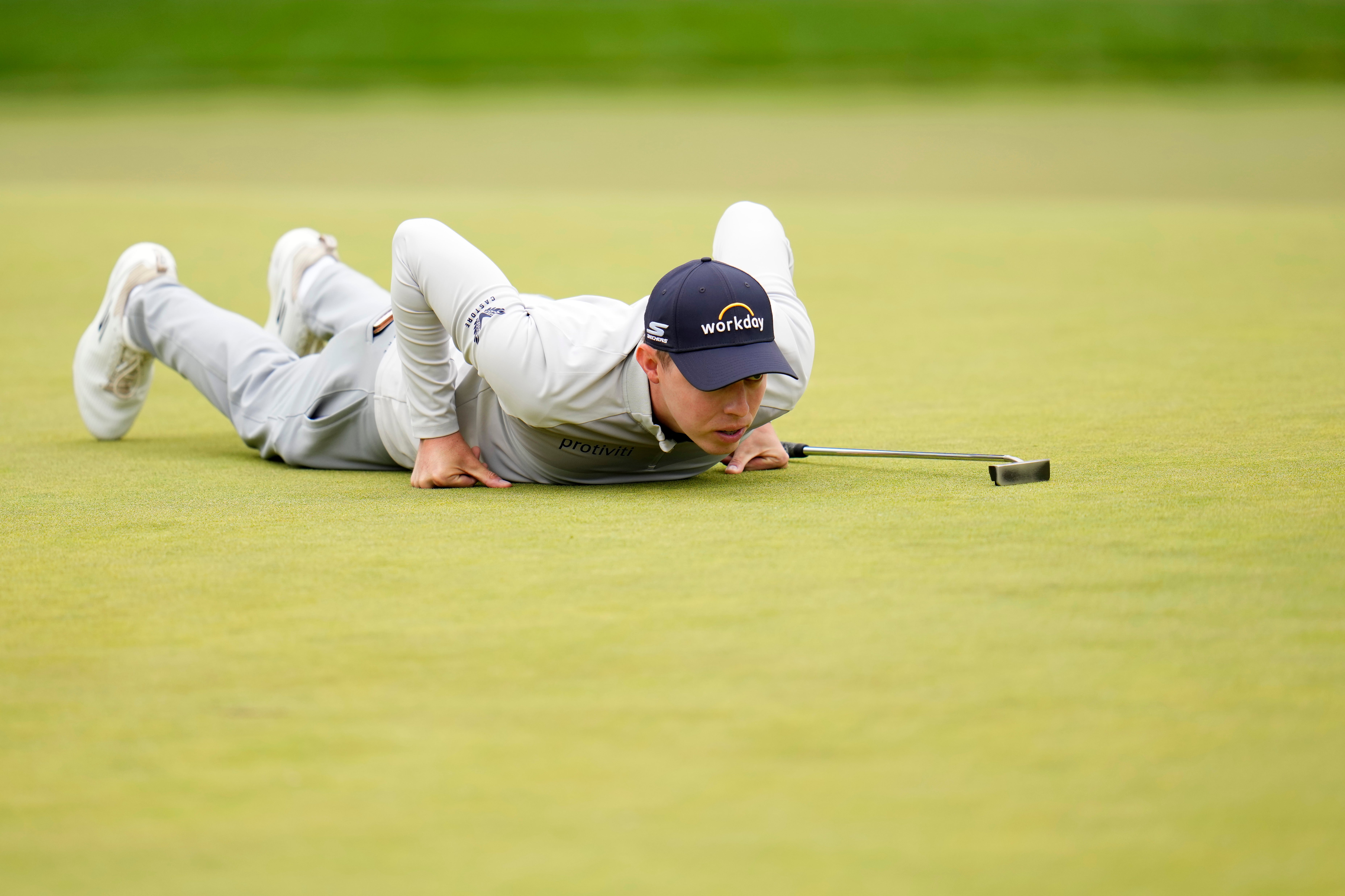 Matt Fitzpatrick lines up a putt on the second hole during the final round of the US Open (Julio Cortez/AP)
