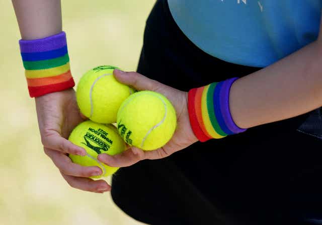 Pride rainbow wrist bands have been worn by volunteers and officials during grass-court events (Mike Egerton/PA)