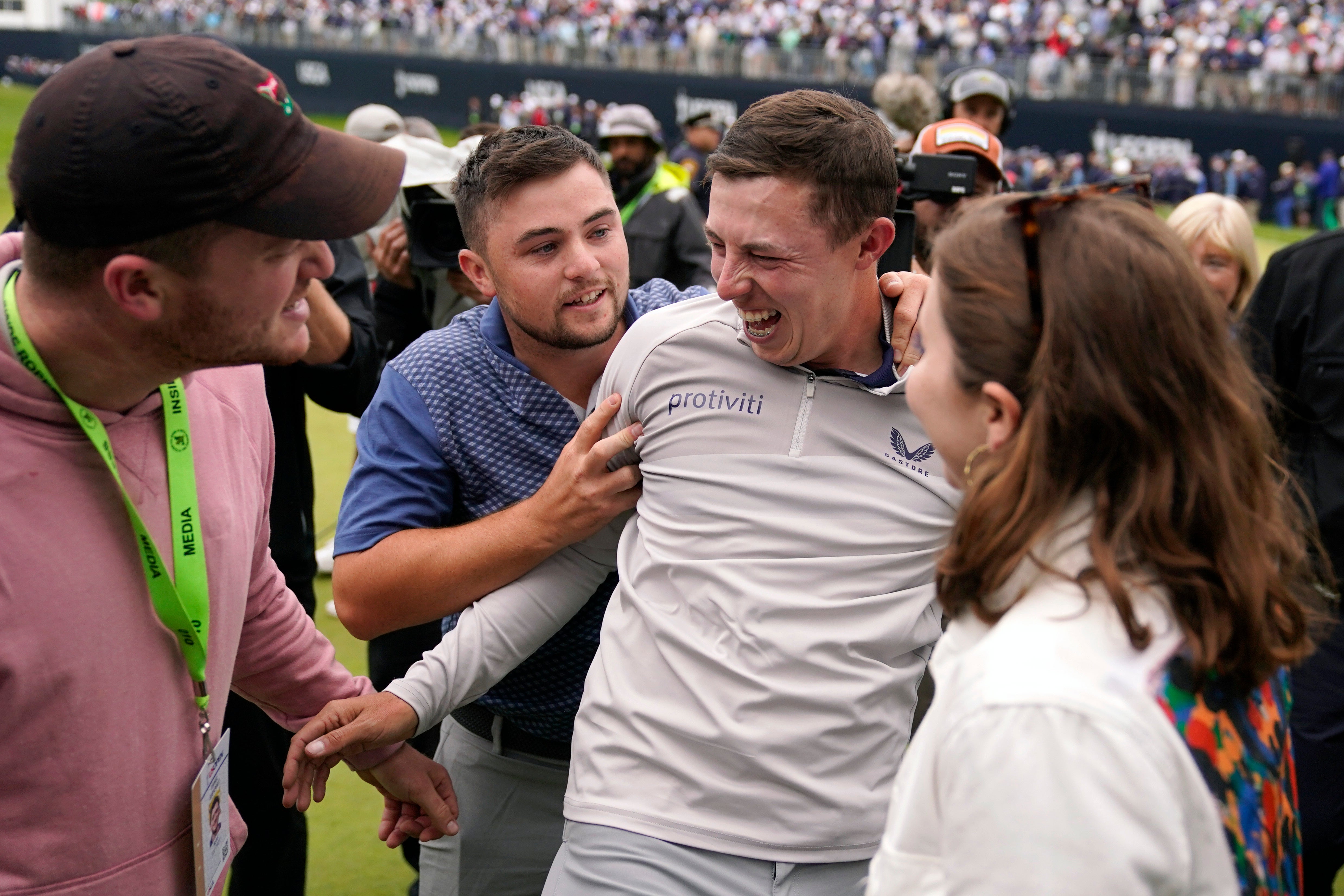Matt Fitzpatrick celebrated with his brother Alex after winning the US Open at Brookline (Charles Krupa/AP/PA)