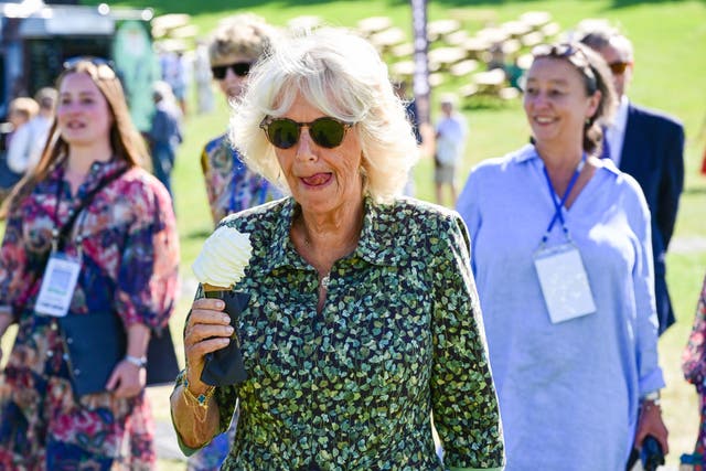 The Duchess of Cornwall enjoys an ice cream (Finnbarr Webster/PA)