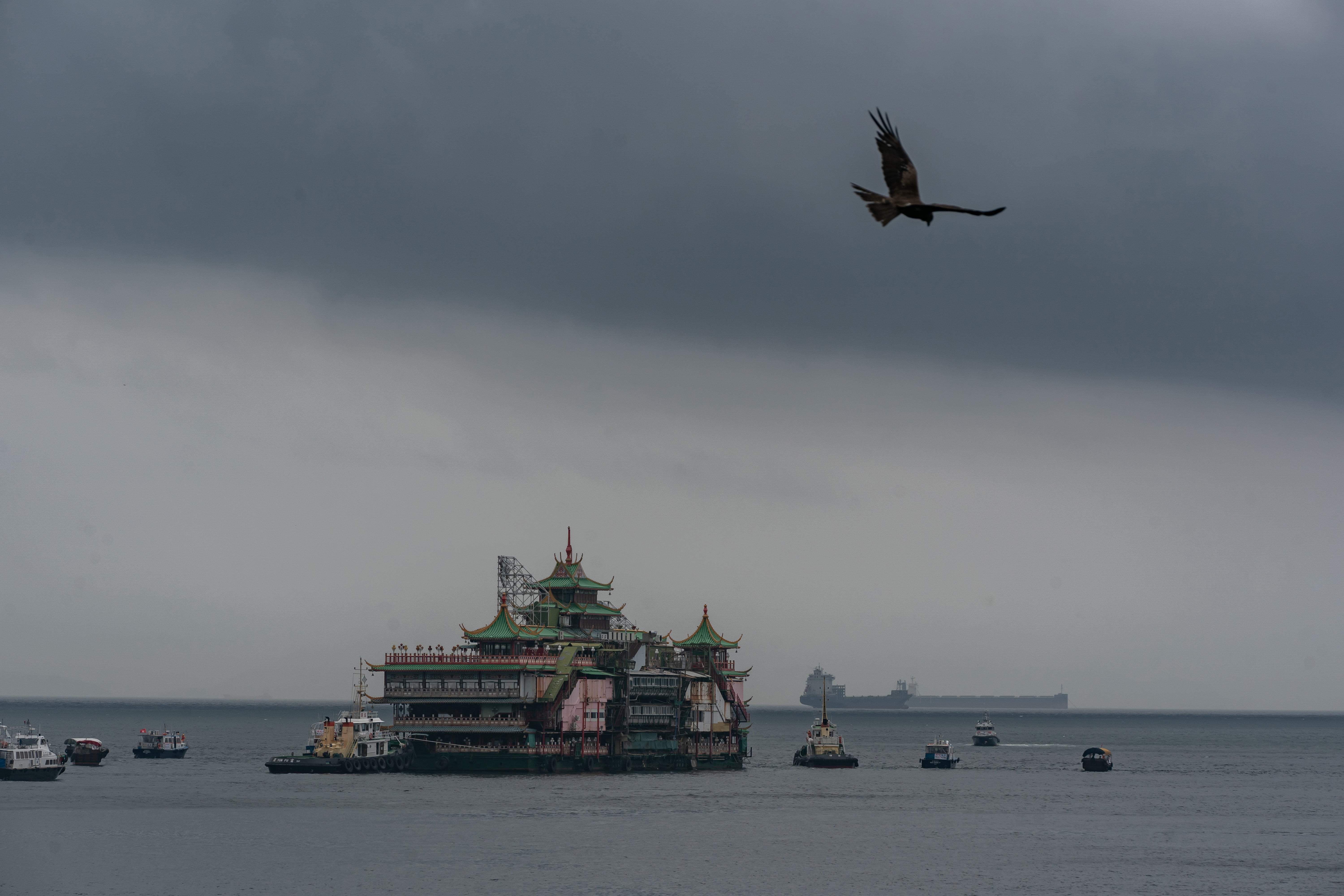 Jumbo Floating Restaurant is towed out of a typhoon shelter in Aberdeen on 14 June 2022