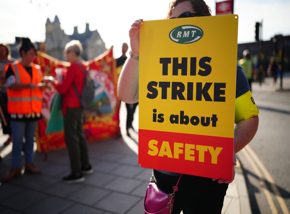 Millions of people are suffering disruption as the largest rail strike for a generation cripples Britain’s train services (Ben Birchall/PA)