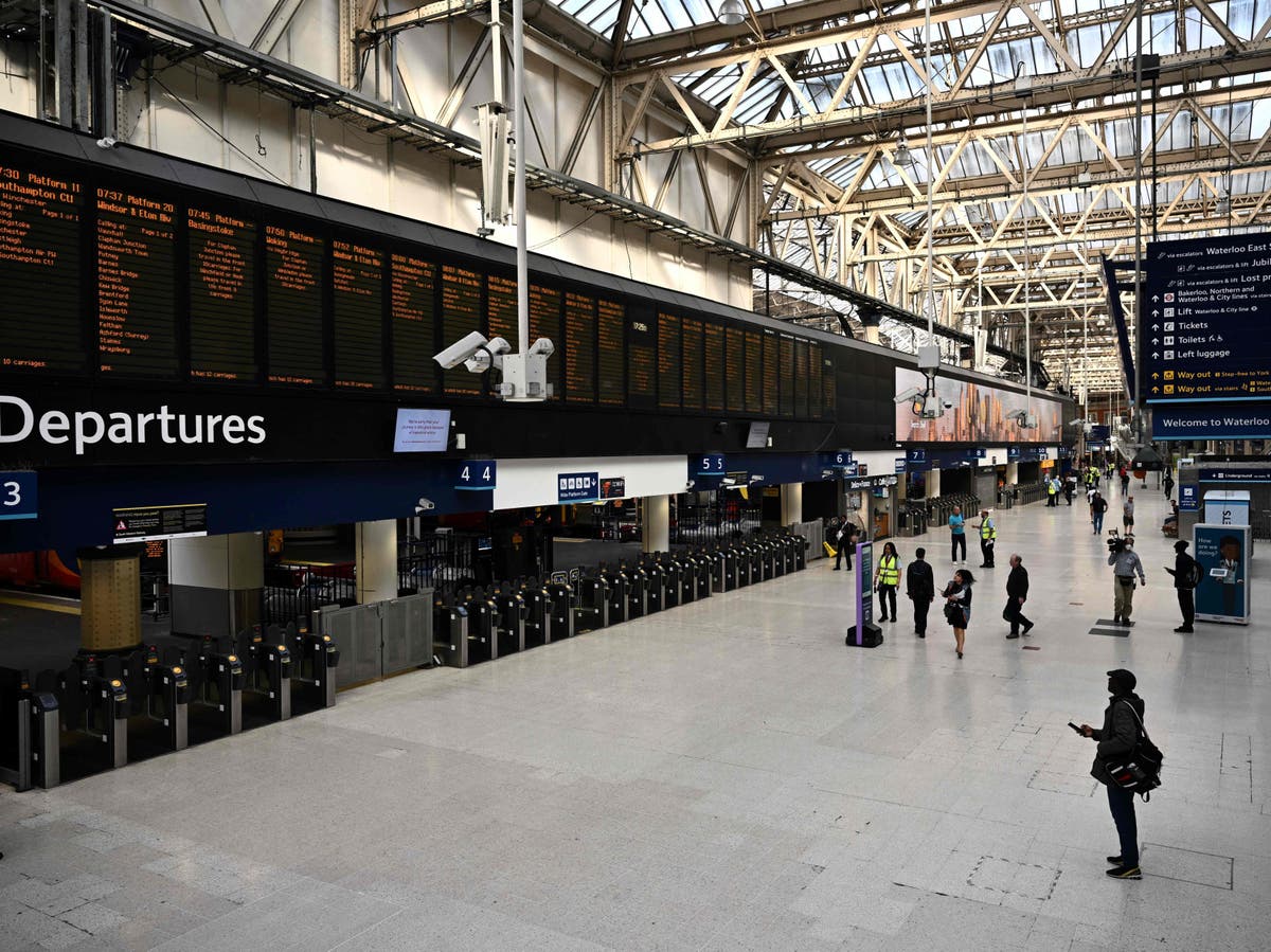 Rail strike - live: Commuters warned to check last train times as traffic clogs roads