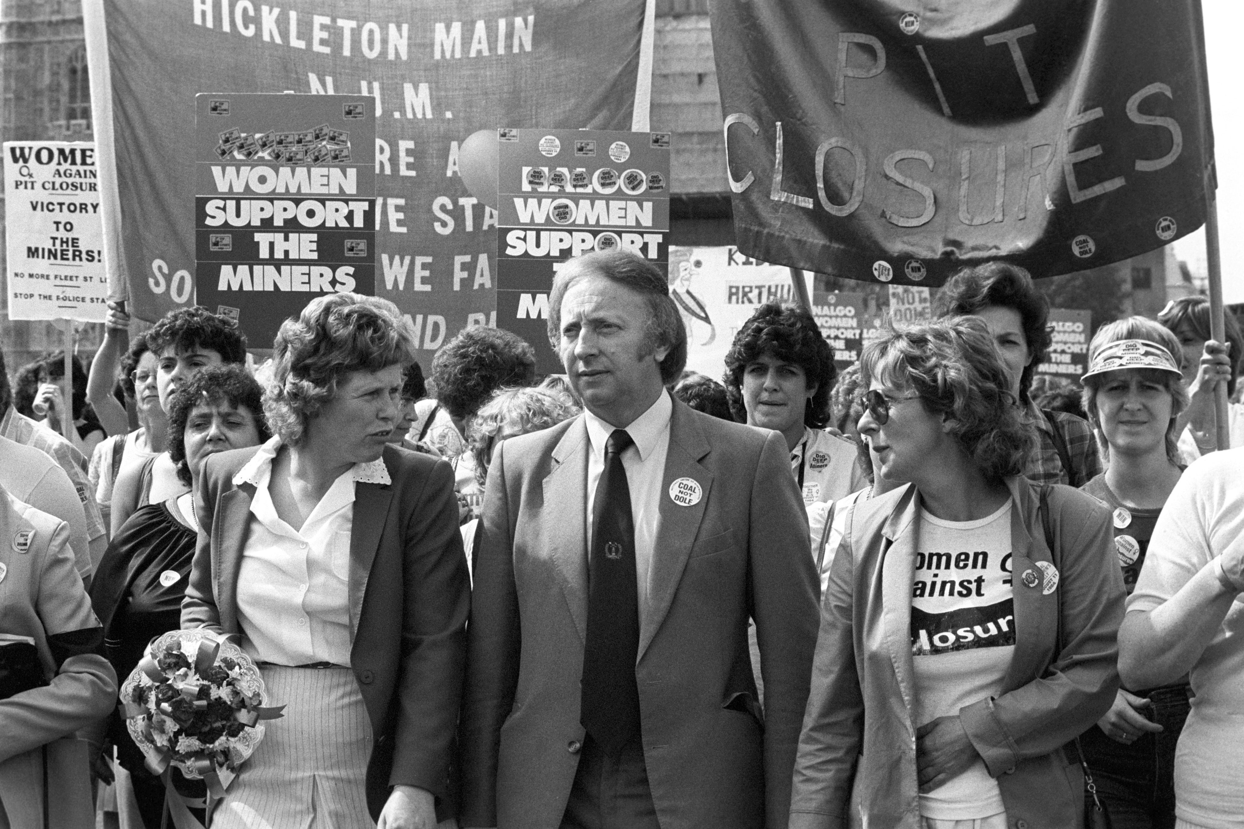 Arthur Scargill and a contingent of Welsh miners’ wives cross Westminster Bridge during the 1984 miners’ strike (PA Archives)