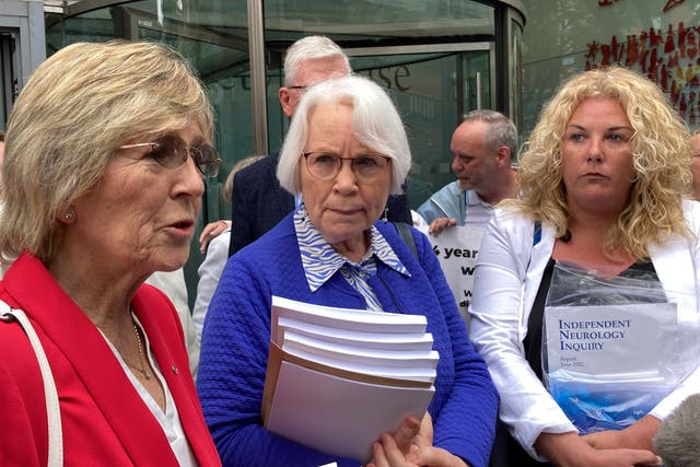 Former patients of Belfast neurologist Dr Michael Watt react following the publication of the report of the Independent Neurology Inquiry. Left to right, Therese Ward, Jean Garland and Danielle O’Neill. (Rebecca Black/PA)