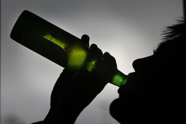 A World Health Organisation report said introducing minimum pricing for alcohol can protect heavy drinkers and reduce harm to people’s health (David Jones/PA)