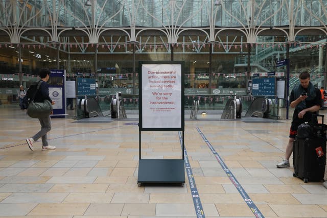 Passengers at Paddington station in London, as members of the Rail, Maritime and Transport union begin their nationwide strike in a bitter dispute over pay, jobs and conditions. Picture date: Tuesday June 21, 2022.